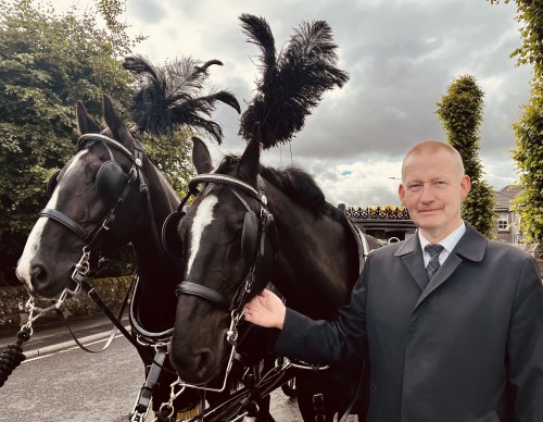 The logo for Alan Beaton Funeral Services